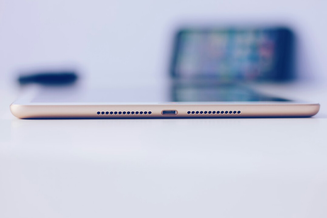 Tablet showing a simple bar chart on a desk