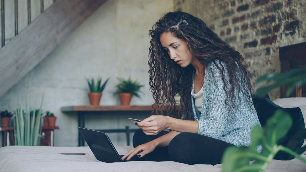 person paying bills online