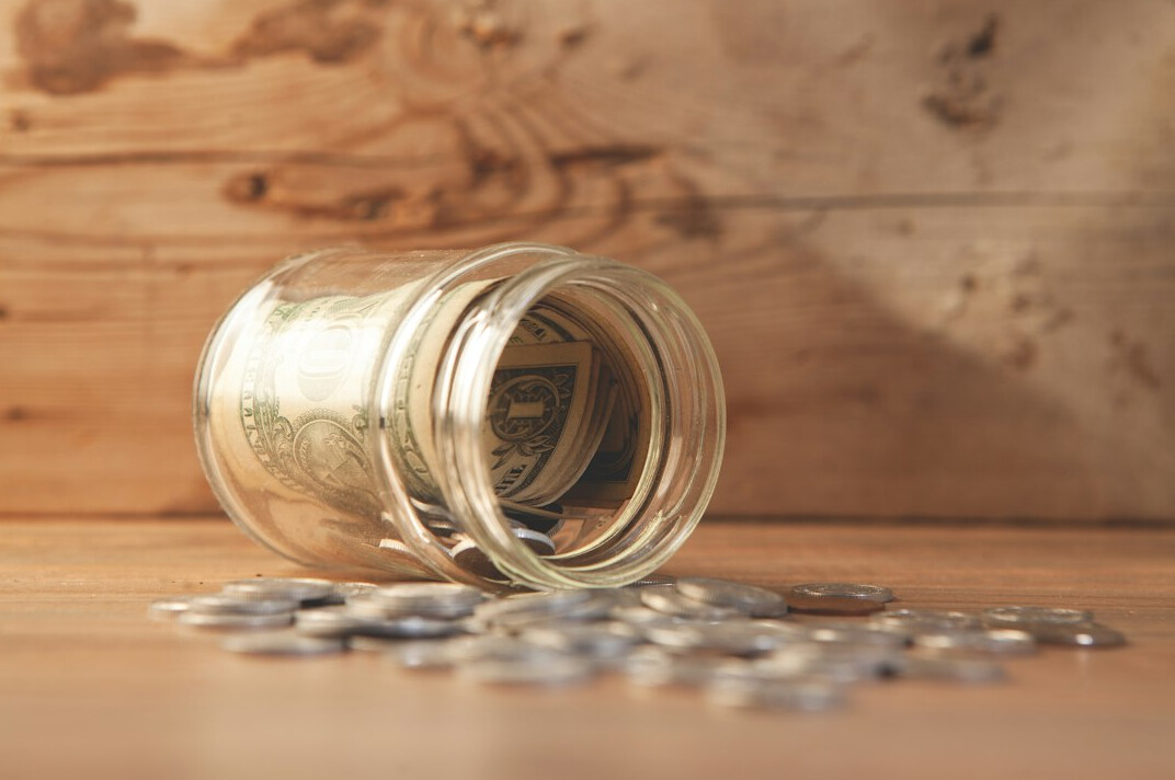 savings jar and calculator